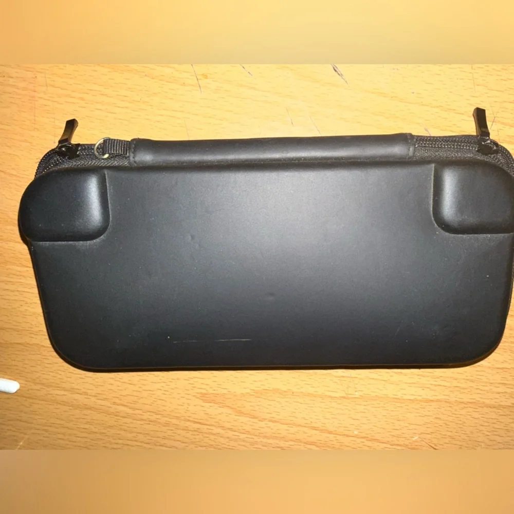 Nintendo Switch Lite Black Handheld Console with Black Charger and Case